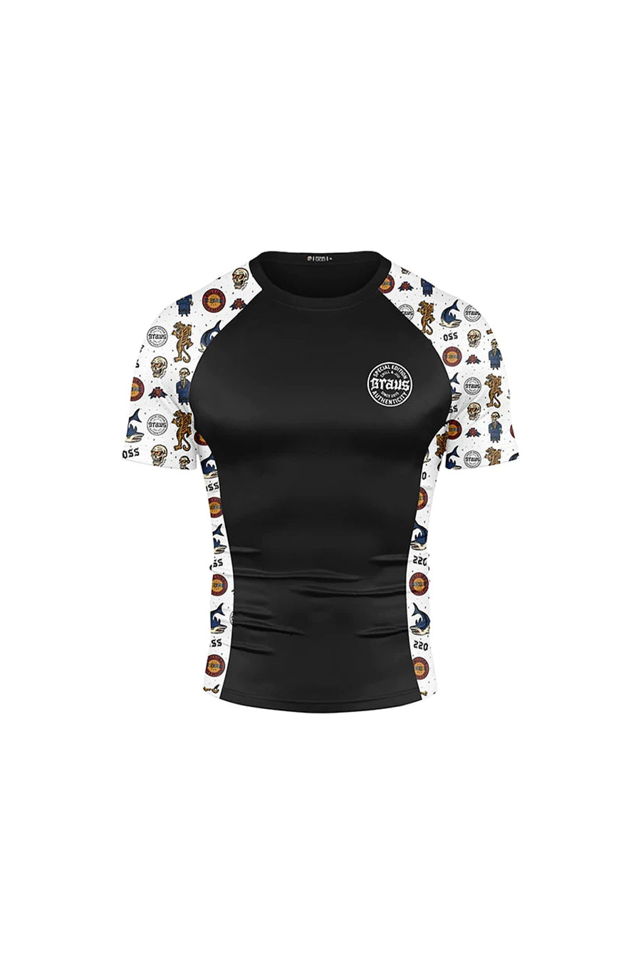 A short-sleeved black rash guard with multicolored geometric patterns on the sleeves and a logo on the chest.